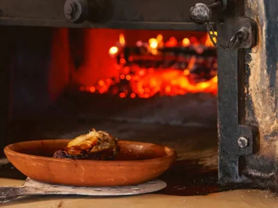 Lechazo asado en horno de leña en Castillo de Izán